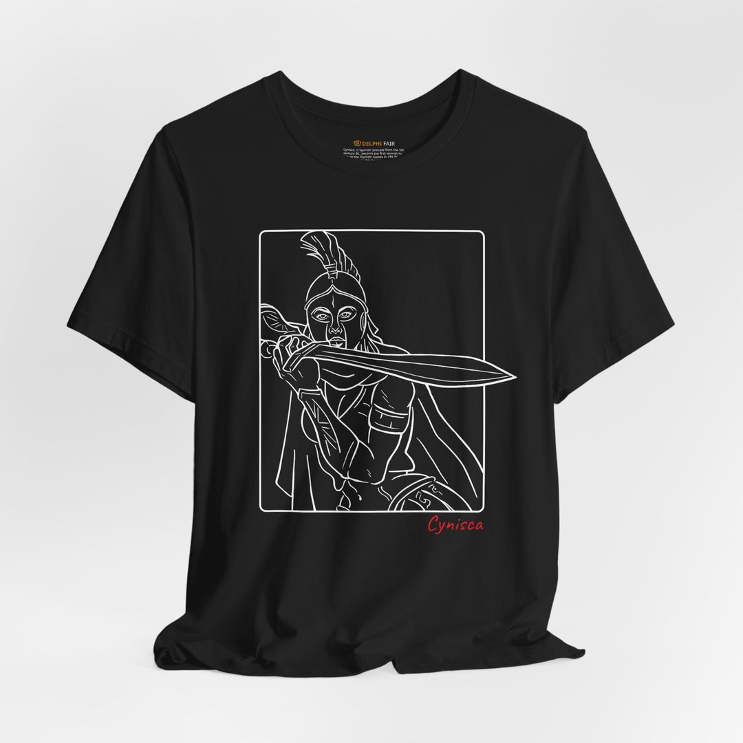 Black t-shirt with a white line graphic of Cynisca in a dramatic close-up pose, holding a sword across her chest inside a rectangular frame, with the red text 'Cynisca' below the design.