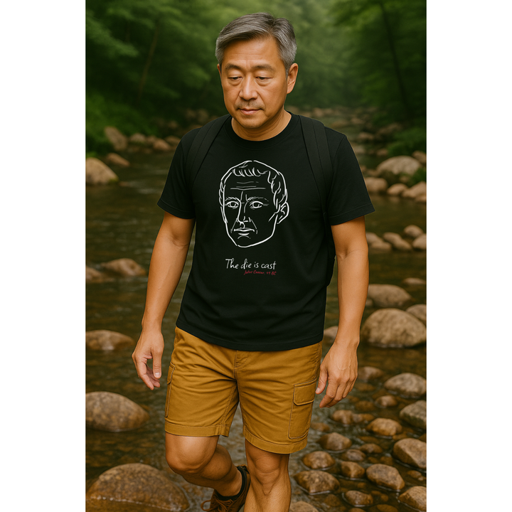 Man walking through the river wearing a black t-shirt with a white graphic of Julius Caesar's head, the quote 'The die is cast,' and the red text 'Julius Caesar 49 BC' below.