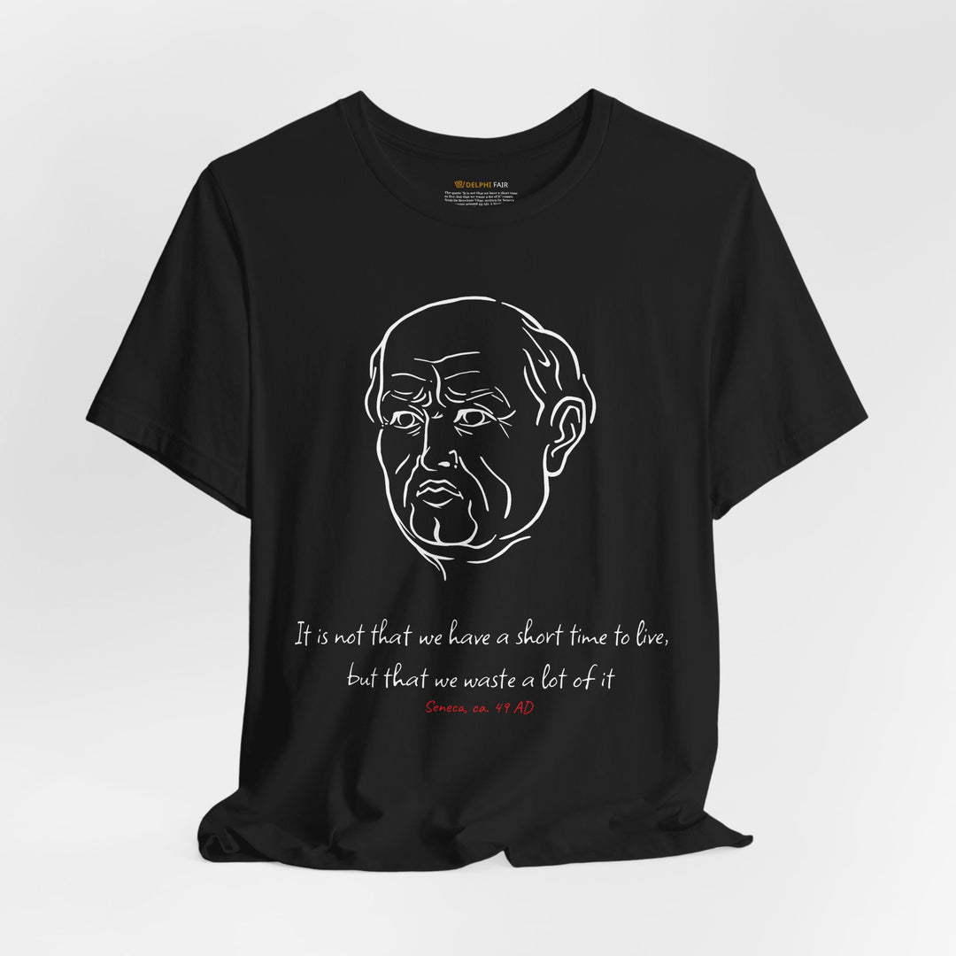 Black t-shirt with a white graphic of Senecas' head, the quote 'It is not that we have a short time to live, but that we waste a lot of it' and the red text 'Seneca, ca. 49 AD' below