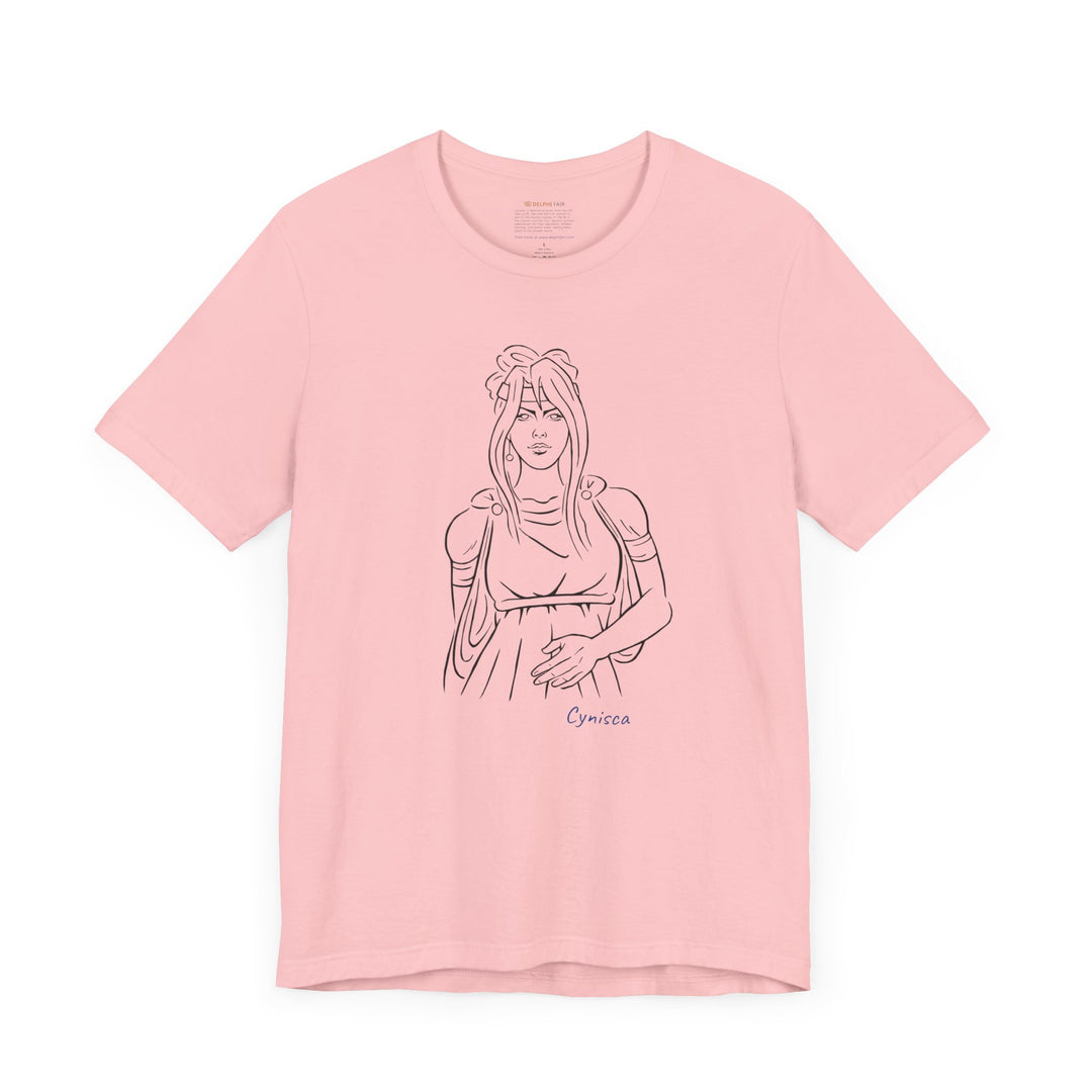Pink t-shirt with a black line graphic of Cynisca in ancient-style casual clothing, with flowing hair and a calm expression, and the blue text 'Cynisca' below the design.