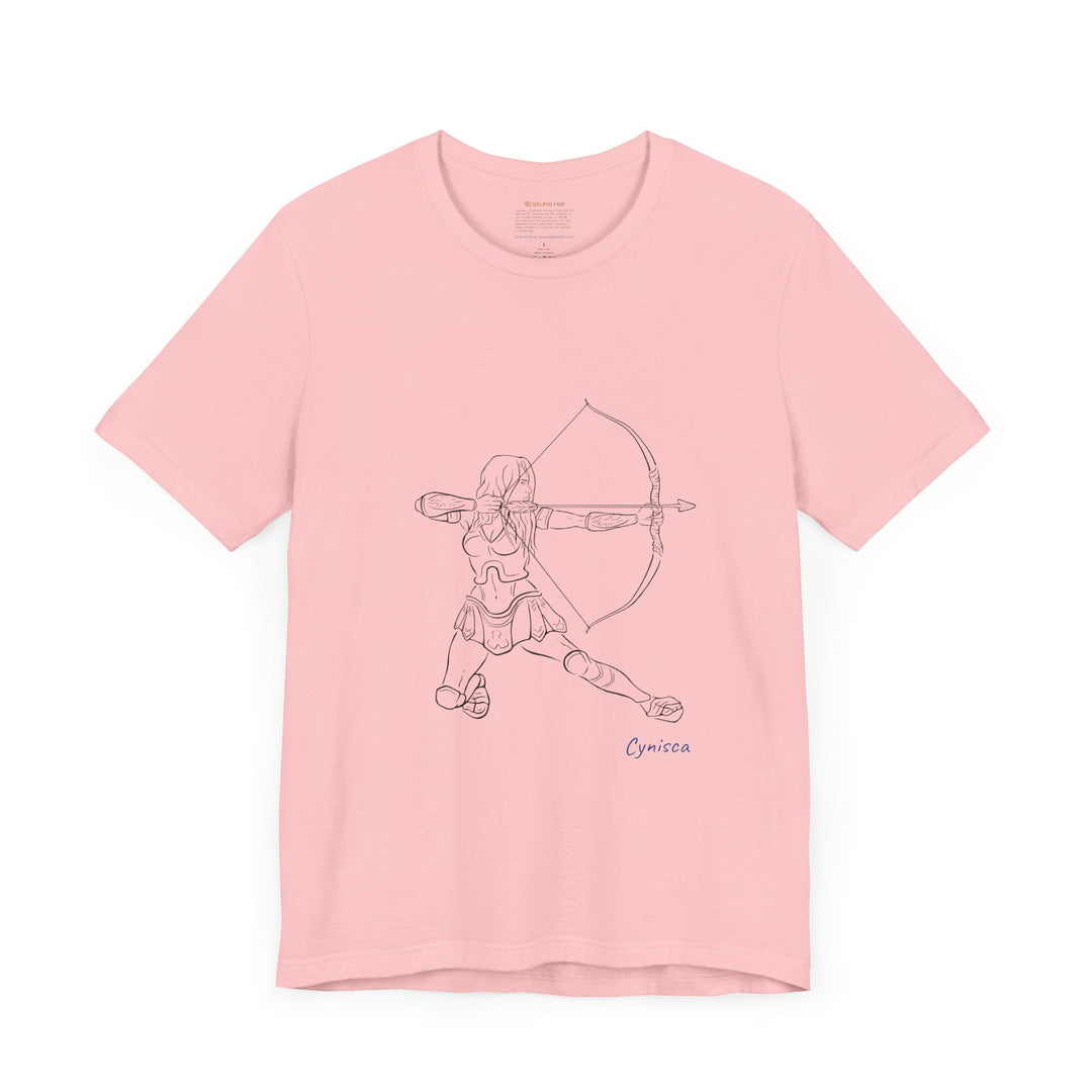 Pink t-shirt with a black line graphic of Cynisca in armor kneeling and drawing a bow, aiming an arrow forward, with the blue text 'Cynisca' below the design.
