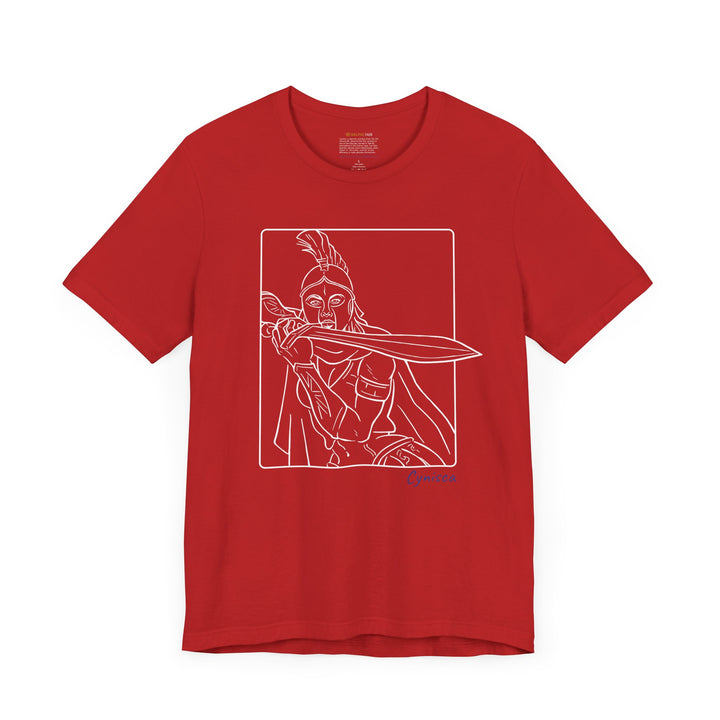 Red t-shirt with a white line graphic of Cynisca in a dramatic close-up pose, holding a sword across her chest inside a rectangular frame, with the blue text 'Cynisca' below the design.
