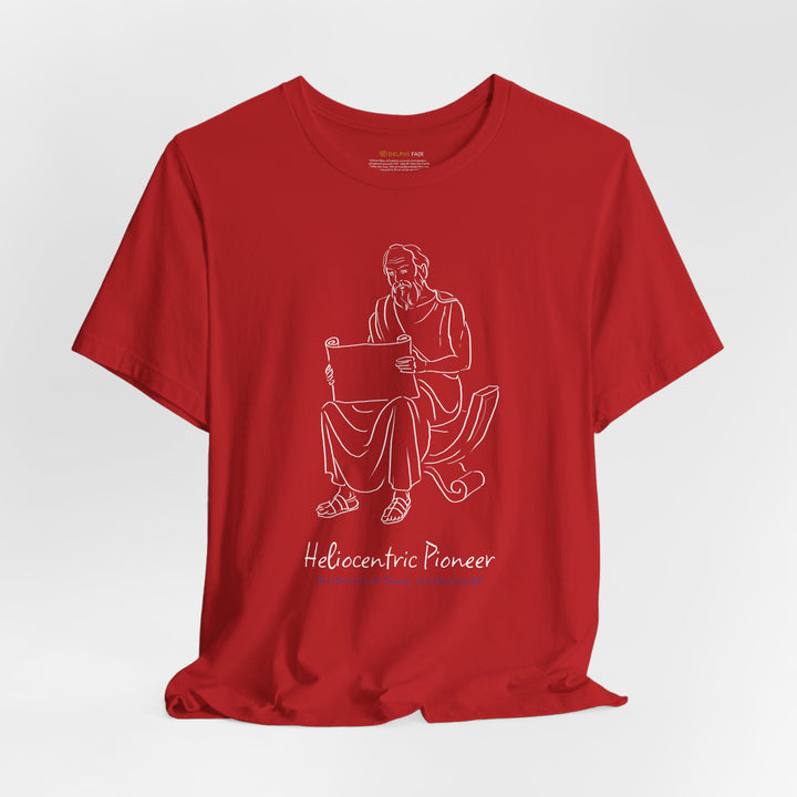 Red t-shirt featuring a white graphic of Aristarchus sitting and reading a scroll, with the text 'Heliocentric Pioneer' and the blue text 'Aristarchus of Samos, 3rd Century BC' below.