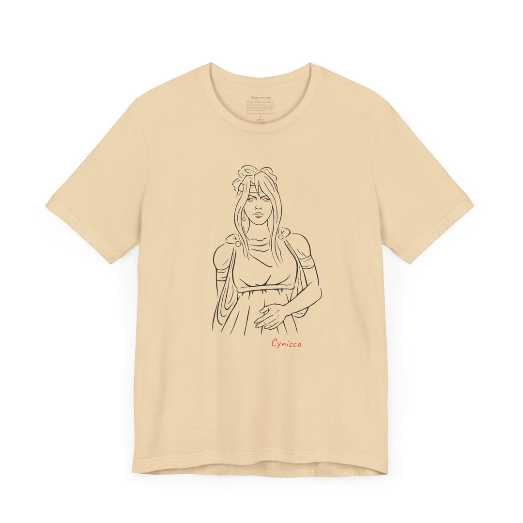Soft-cream t-shirt with a black line graphic of Cynisca in ancient-style casual clothing, with flowing hair and a calm expression, and the red text 'Cynisca' below the design.