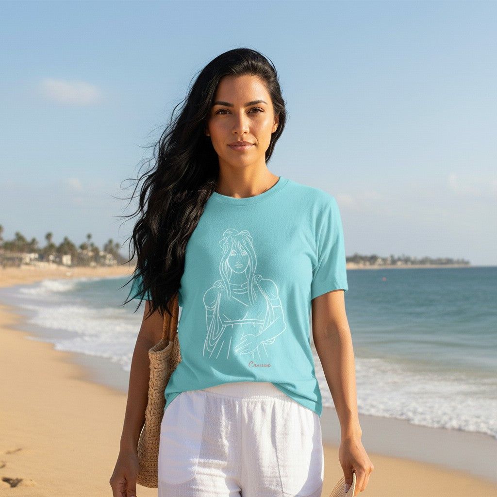 Beautiful woman on the beach wearing a turquoise Cynisca t-shirt featuring the Spartan princess in casual clothing.