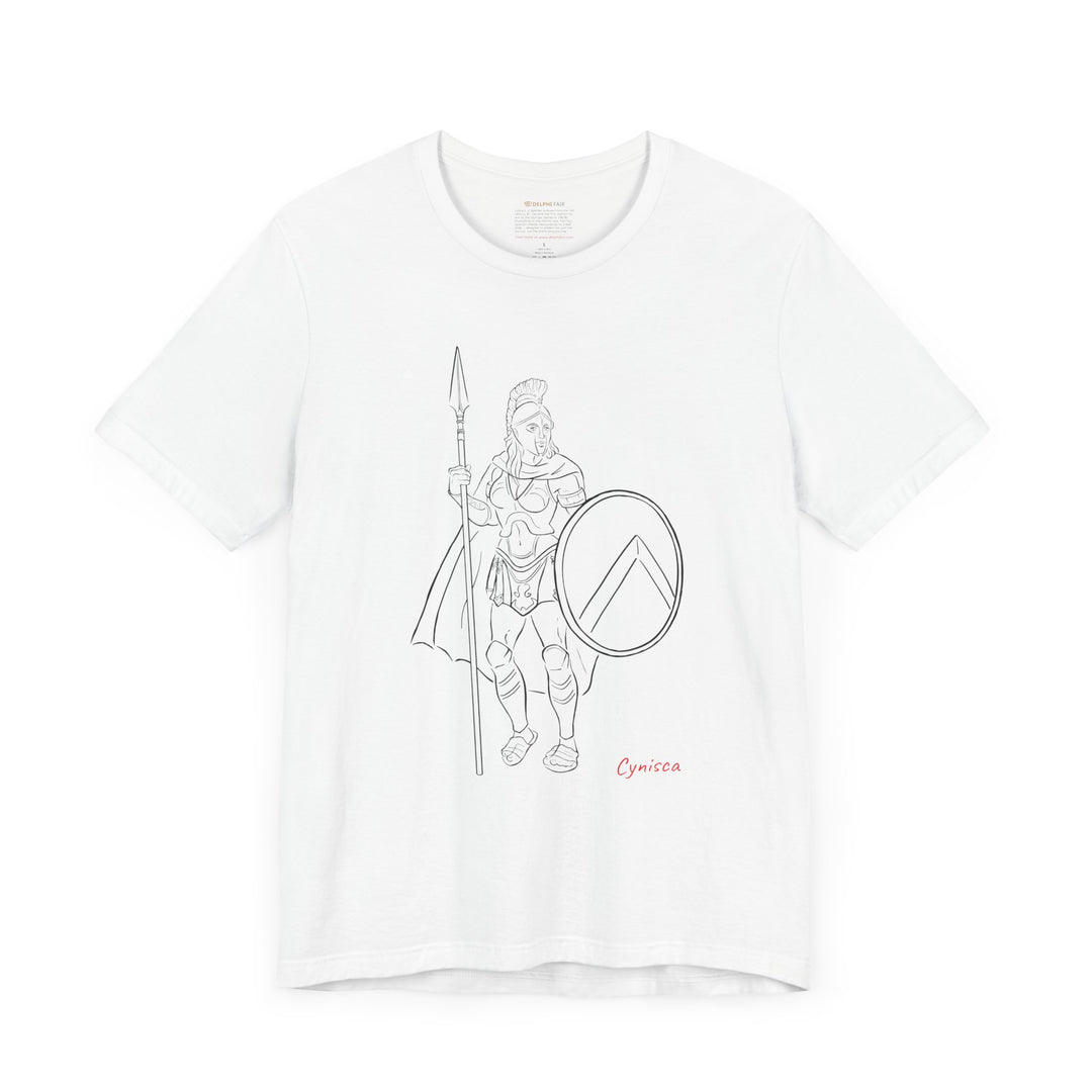 White t-shirt with a black line graphic of Cynisca standing in full Spartan armor, holding a spear and a round shield with a lambda symbol, with the red text 'Cynisca' below the design.