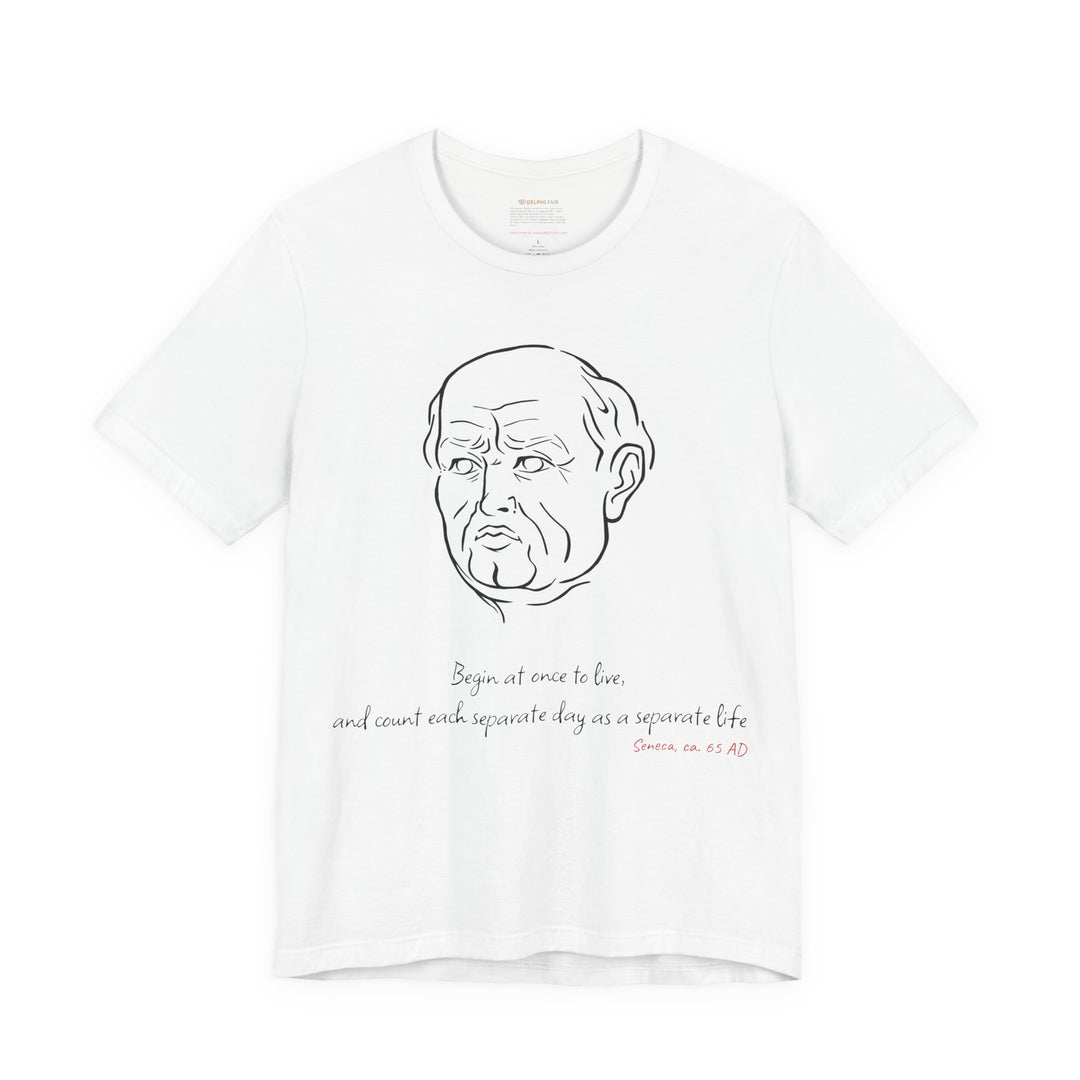 White t-shirt with a black graphic of Senecas' head, the quote 'Begin at once to live, and count each separate day as a separate life' and the red text 'Seneca, ca. 65 AD' below
