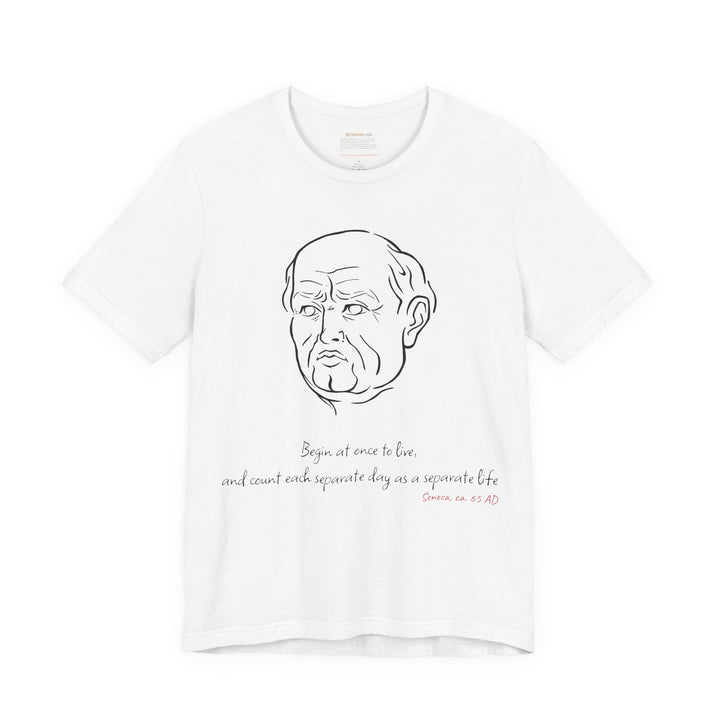 White t-shirt with a black graphic of Senecas' head, the quote 'Begin at once to live, and count each separate day as a separate life' and the red text 'Seneca, ca. 65 AD' below
